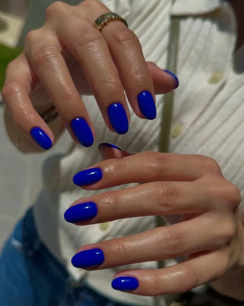august nail colors 2026, glossy deep cobalt blue round nails full set