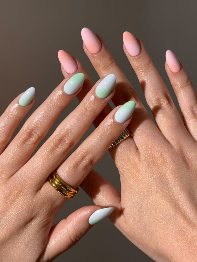 august nails, almond peach to pink and sage to blue ombre nails with soft aura gradient