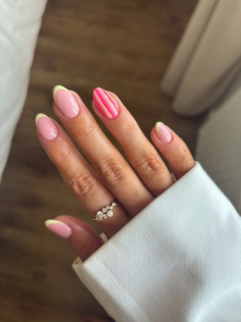 summer nails, almond pale lime micro French tips with hot pink candy stripe accent nail