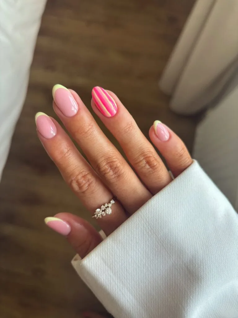 summer nails, almond pale lime micro French tips with hot pink candy stripe accent nail
