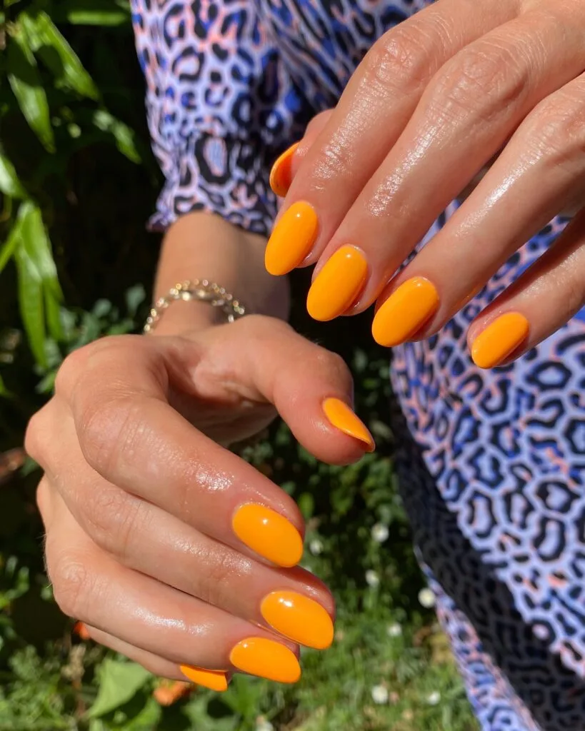 summer nail colors, glossy mango orange round nails full set