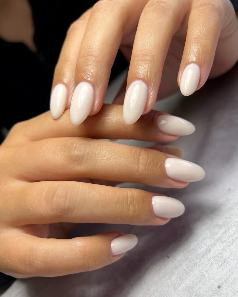 trending nail colors, long almond milky vanilla cream nails