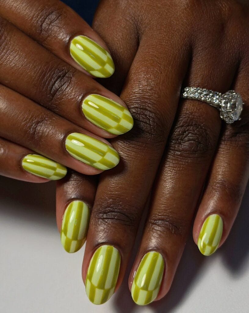 trending nail colors, round chartreuse nails with two tone stripe and checker art