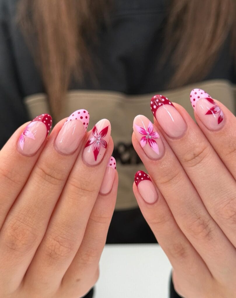 summer nail colors, almond French nails with red polka dot tips and pink hibiscus flower art