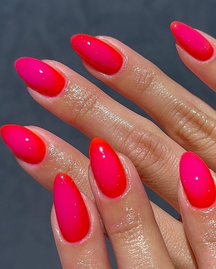 trending nail colors, long almond hot pink and red ombre jelly nails