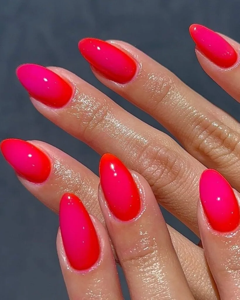 trending nail colors, long almond hot pink and red ombre jelly nails