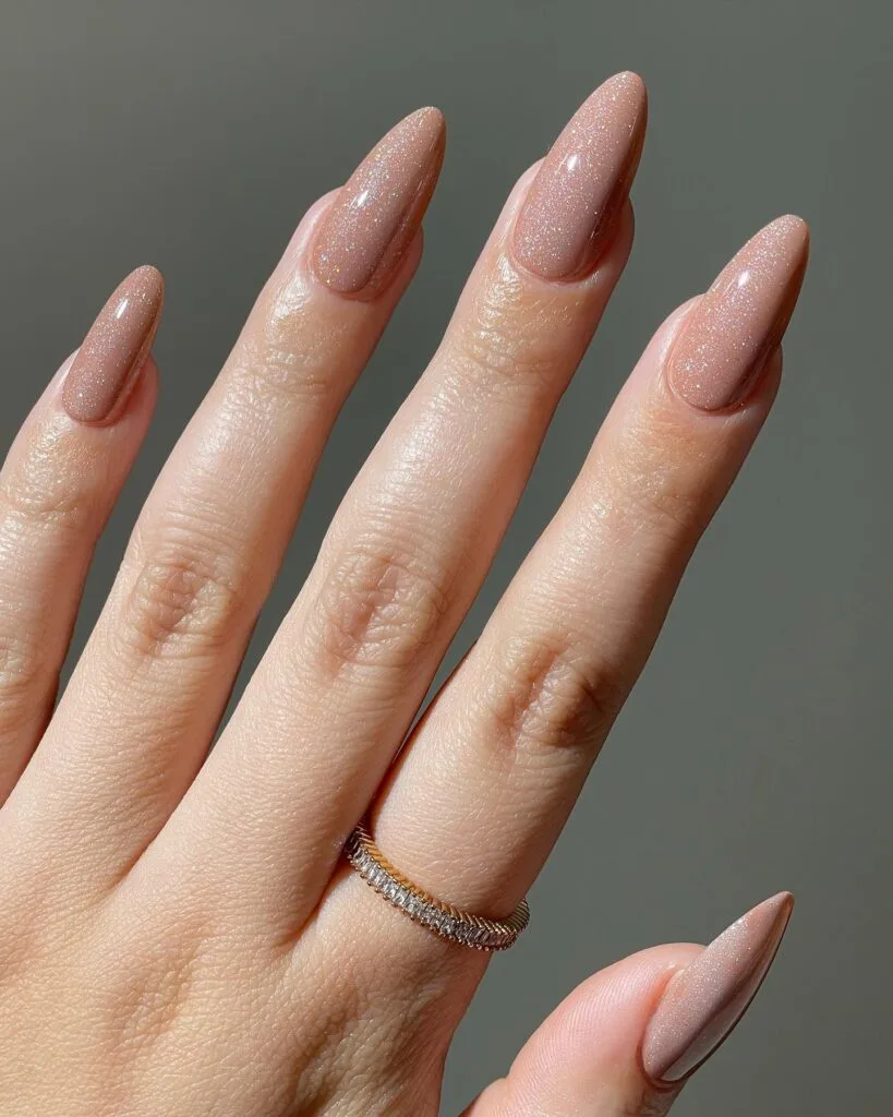 trending nail colors, long almond nude bronze shimmer nails