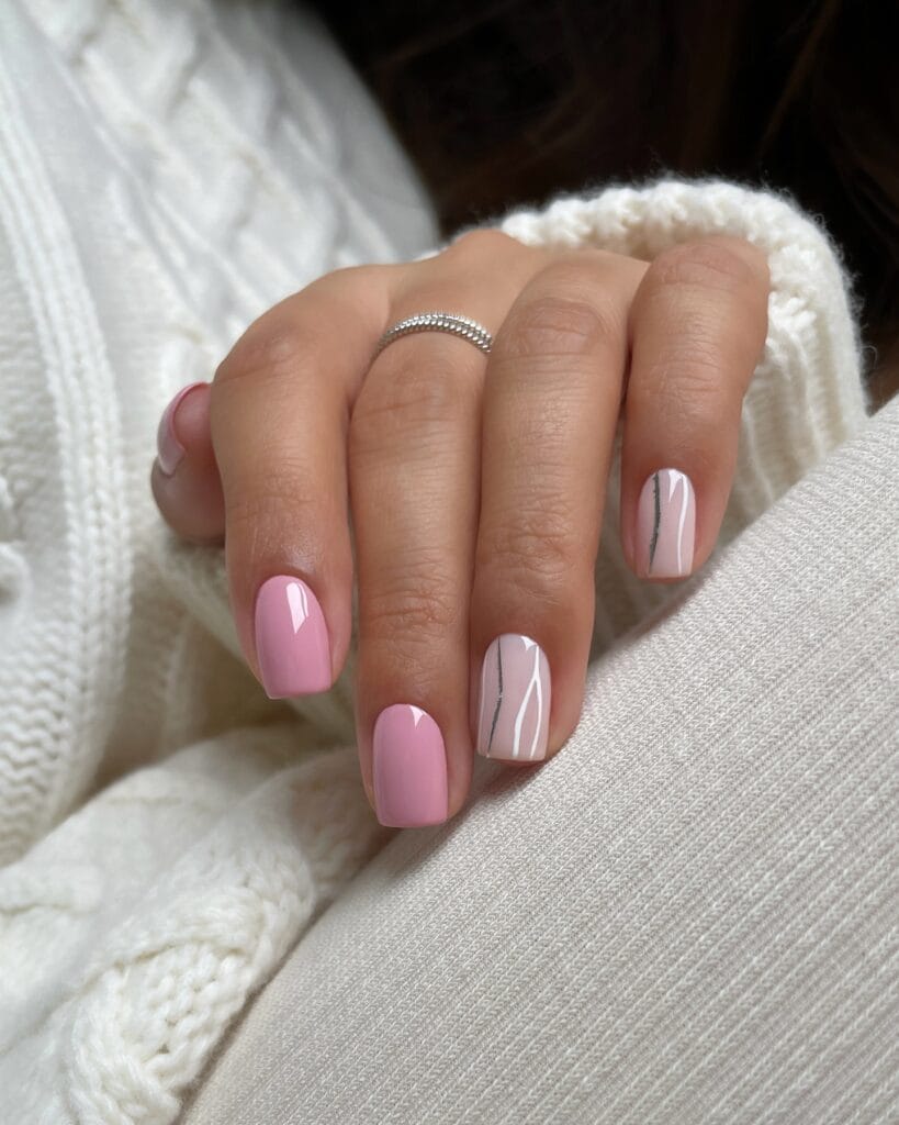 Short fall nail designs in dusty pink and milky white with thin white and metallic-gray lines.