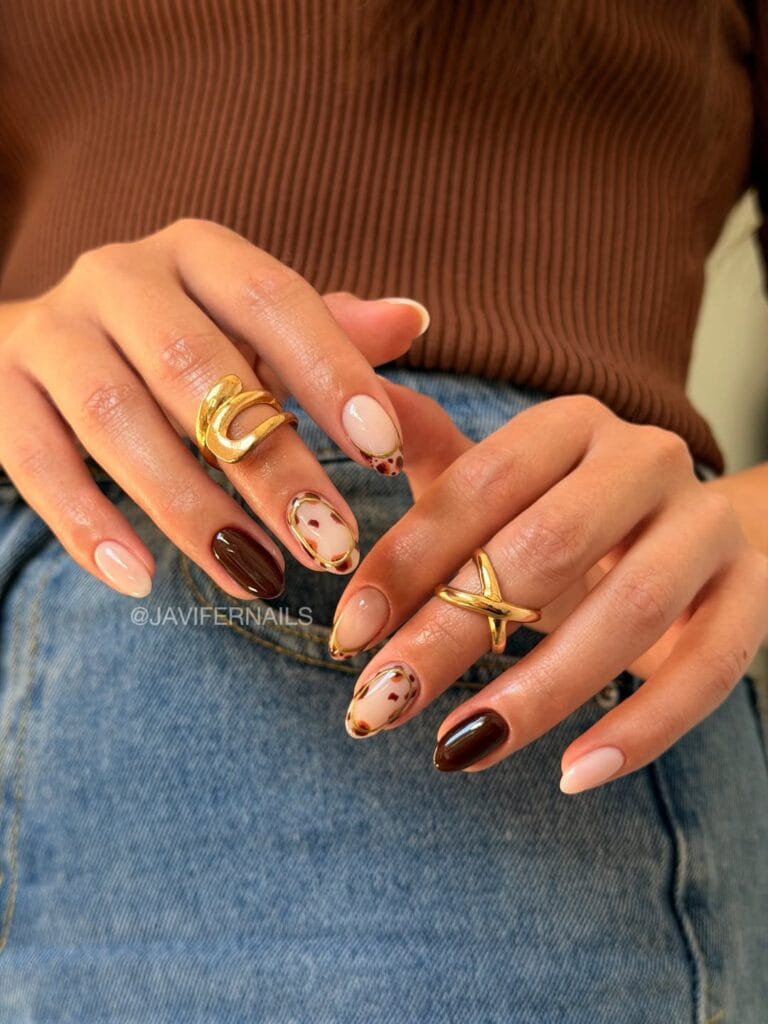 Brown and nude fall nail designs with gold outlines, spotted accents