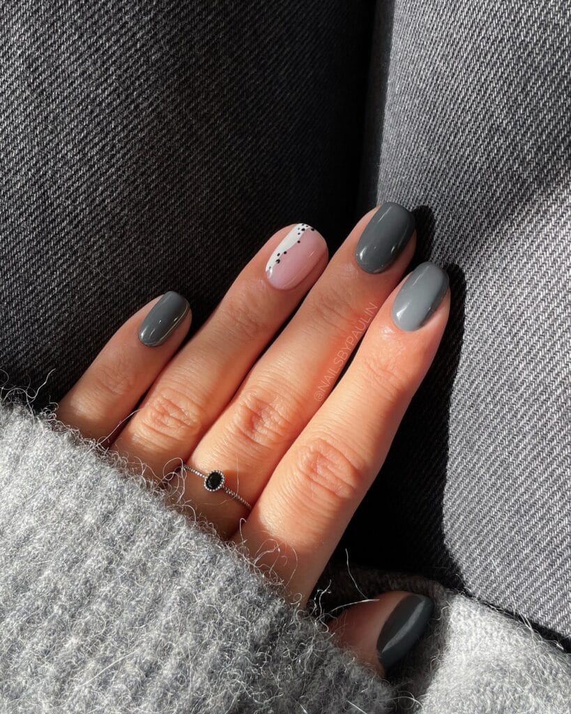 Mixed glossy oyster gray nails with one pale pink accent, fall nails