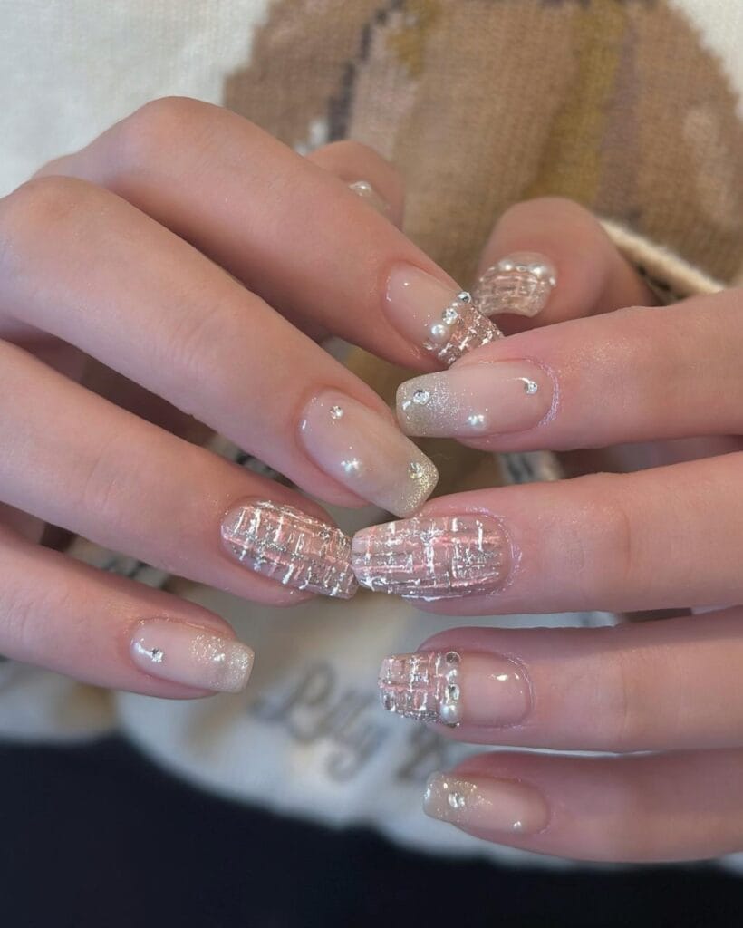 Short square 2026 autumn nails in sheer nude with pink and silver tweed weave and pearls