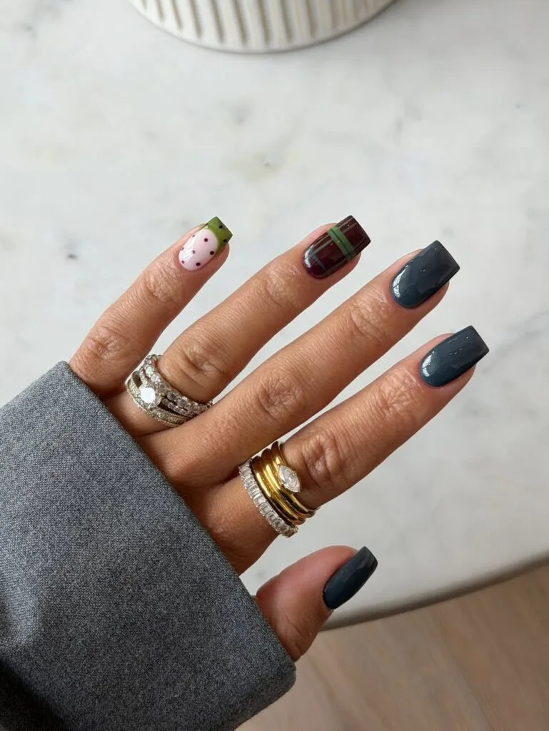 Short fall nail designs with smoky gray polish, burgundy plaid, olive accents, and square tips.
