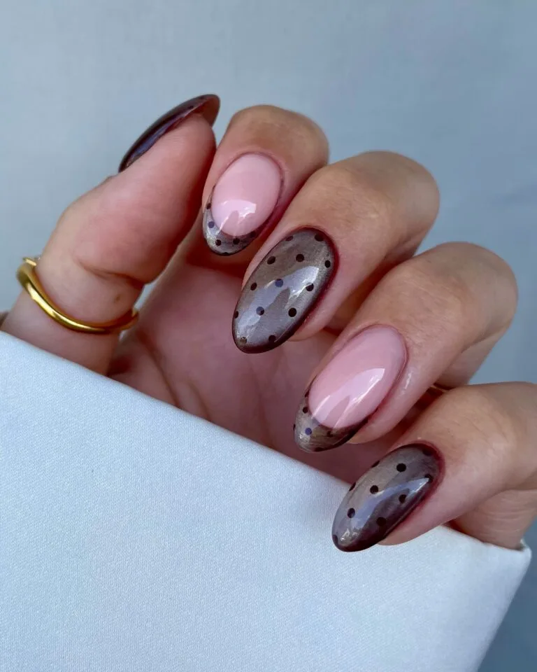 Almond autumn nails with silvery shimmer, dark borders and dots, alternating with pink-based French tips.