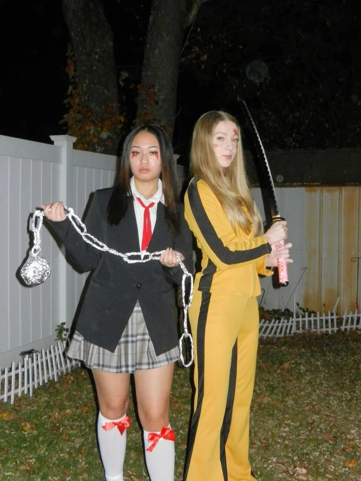 Kill Bill costumes for best friends with a yellow tracksuit, plaid school uniform, red bows, and weapon props.