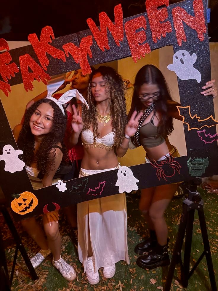 Halloween photo frame decorated with ghosts, bats, pumpkins, and glitter letters