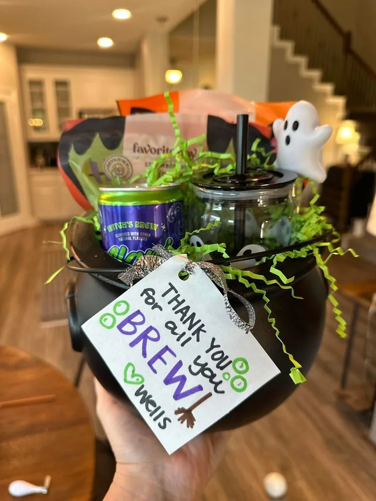 Black cauldron Halloween party favor with treats and a "Thank you for all you BREW!" tag