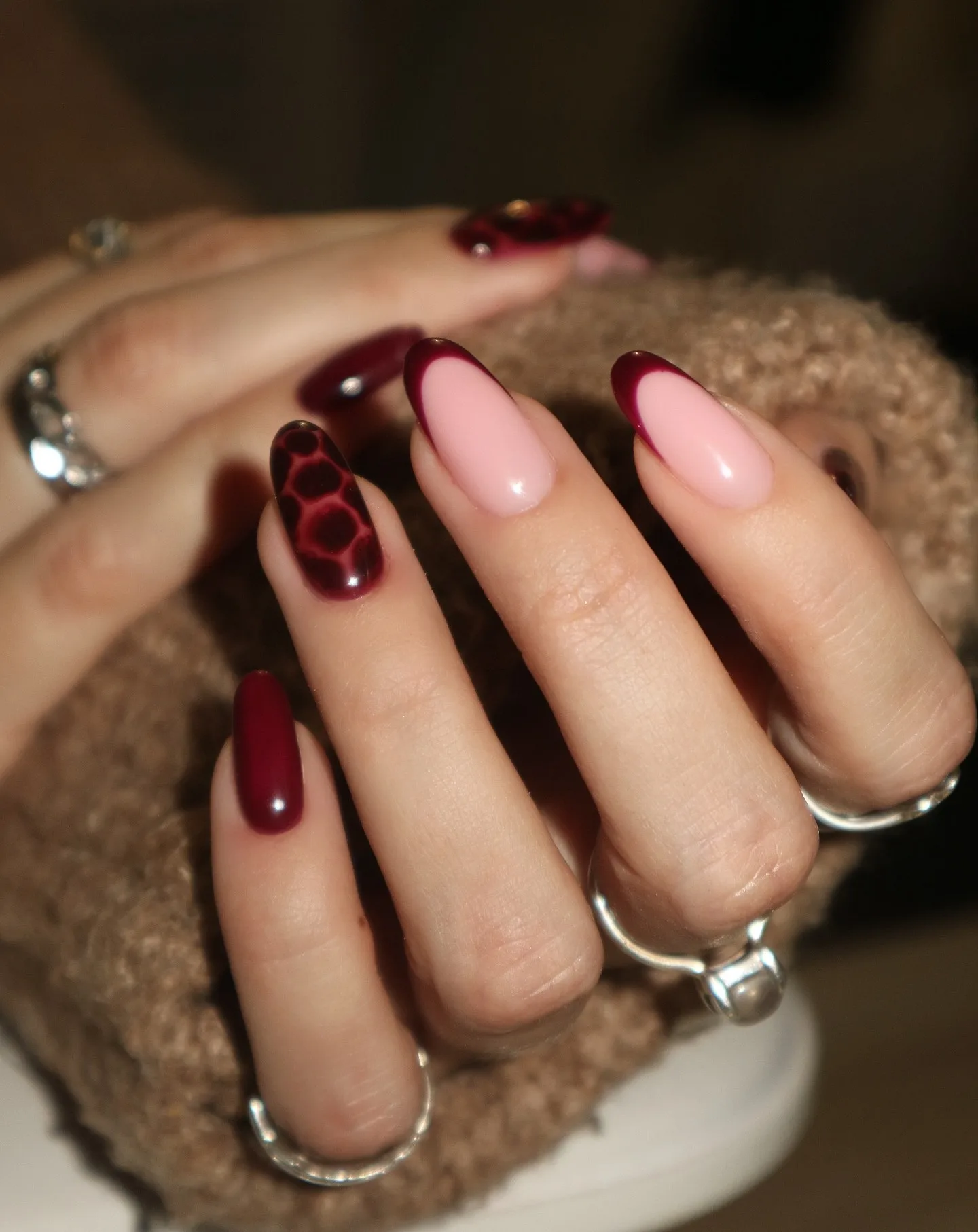 Almond November nail colors in merlot with a croc-print accent and merlot French tips